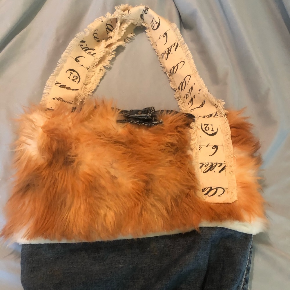 Upcycled Demin and faux fur handbag.